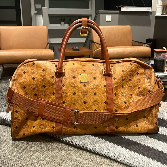 MCM Handbags - MCM large leather duffle travel bag